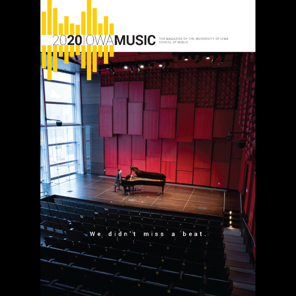 cover of 2020 Iowa Music Magazine showing a lone piano player, wearing a face mask, seated at the piano on stage in an empty recital hall