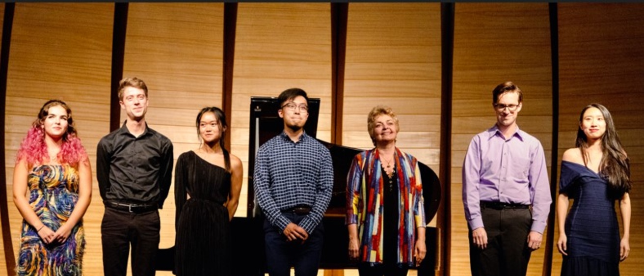 Katya Moeller, Craig Jordan, Ana Yam, Peter Bowen Liu, Dr. Ksenia Nosikova, Neil Krzeski, and Canlin Qiu stand for ovation after UI Recital During the Making Connections Piano Festival in Brazil