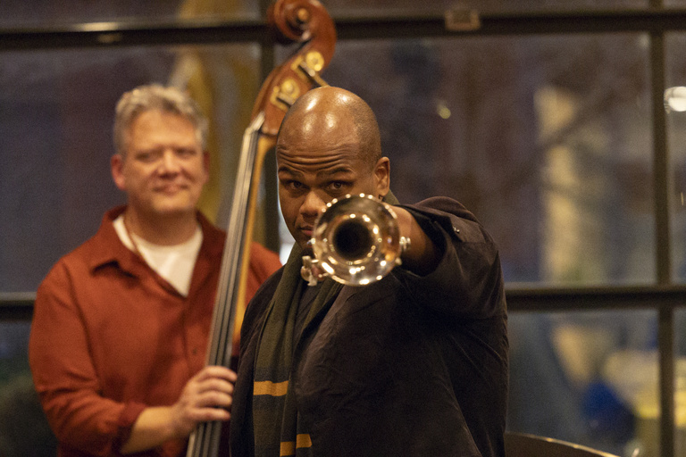 Curtis Taylor at Jazz Jam, pointing his trumpet at the camera