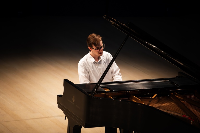 pianist performing with an emotional expression