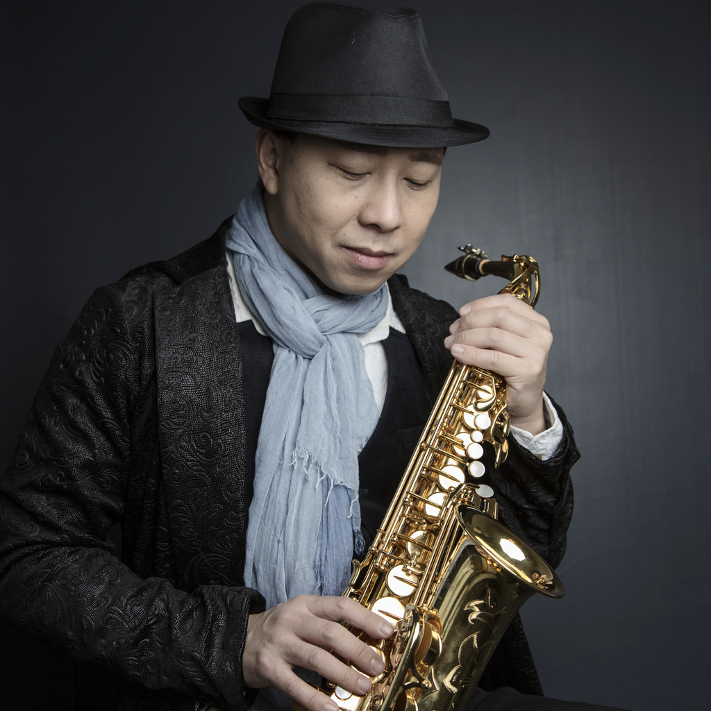 A portrait of saxophonist Kenneth Tse