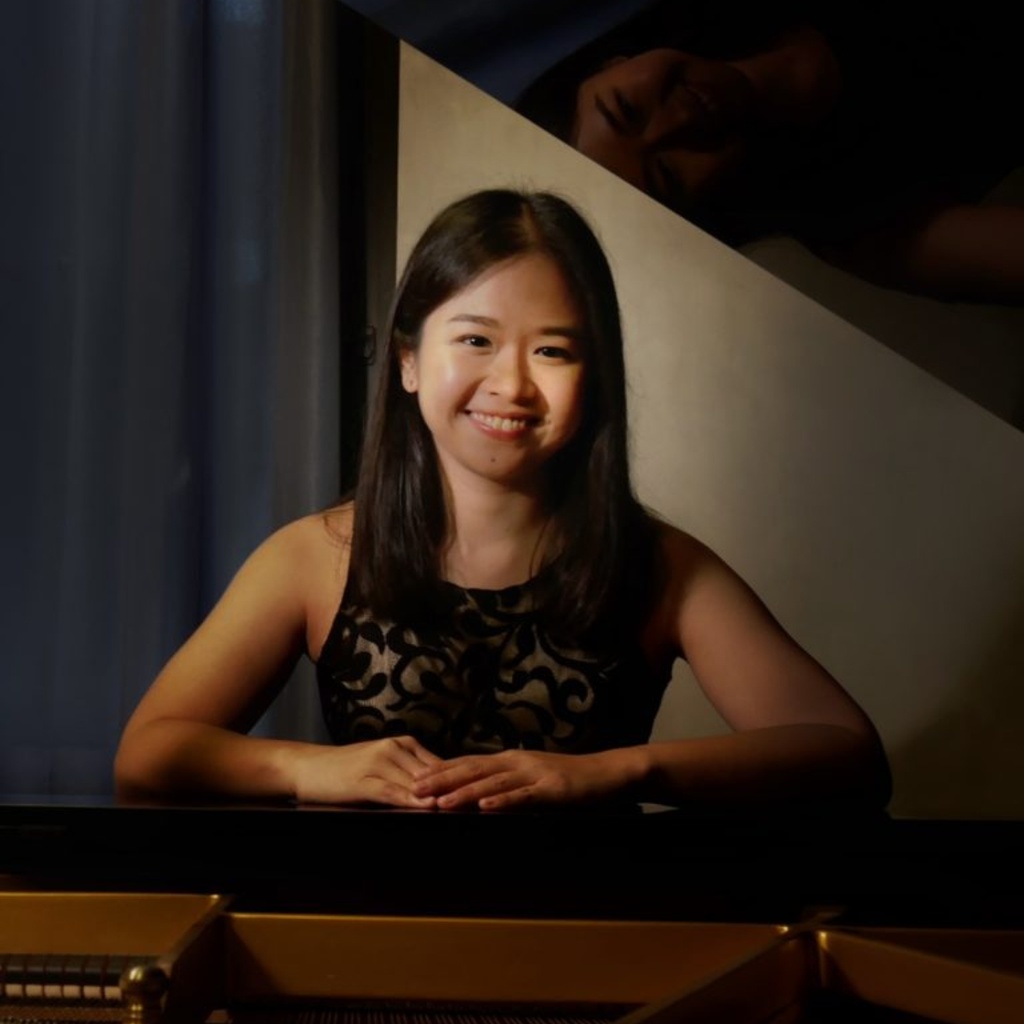 Korak Lertpibulchai seated at piano