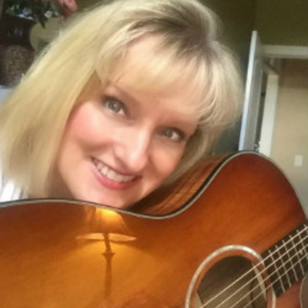 Catherine Wilson pictured with her guitar
