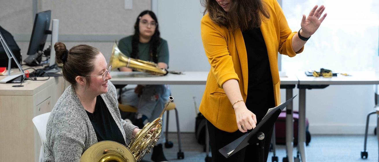 Dr Katy Ambrose instructing a student in the Iowa Horn Studio