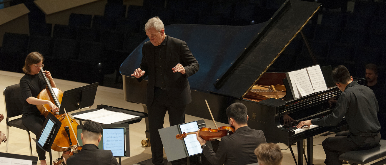 David Gompper conducting students during a performance