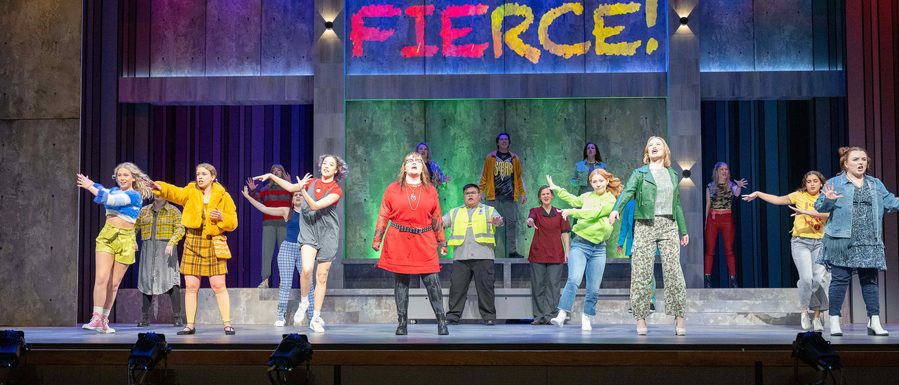 cast on stage during a dance number in the opera Fierce, performed at Hancher in Spring 2024