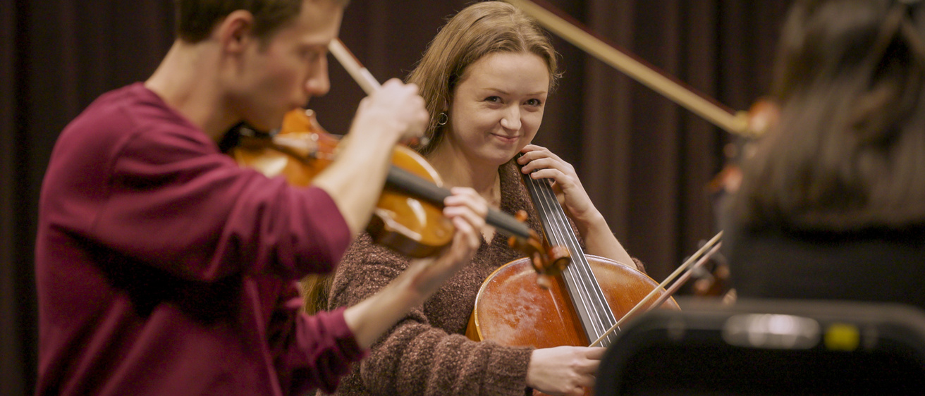chamber music students playing instruments during a recent residency with Jessie Montgomery