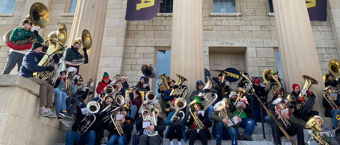 Musicians perform Christmas songs as part of Holiday Tubas at the Old Capitol on Dec. 13, 2024