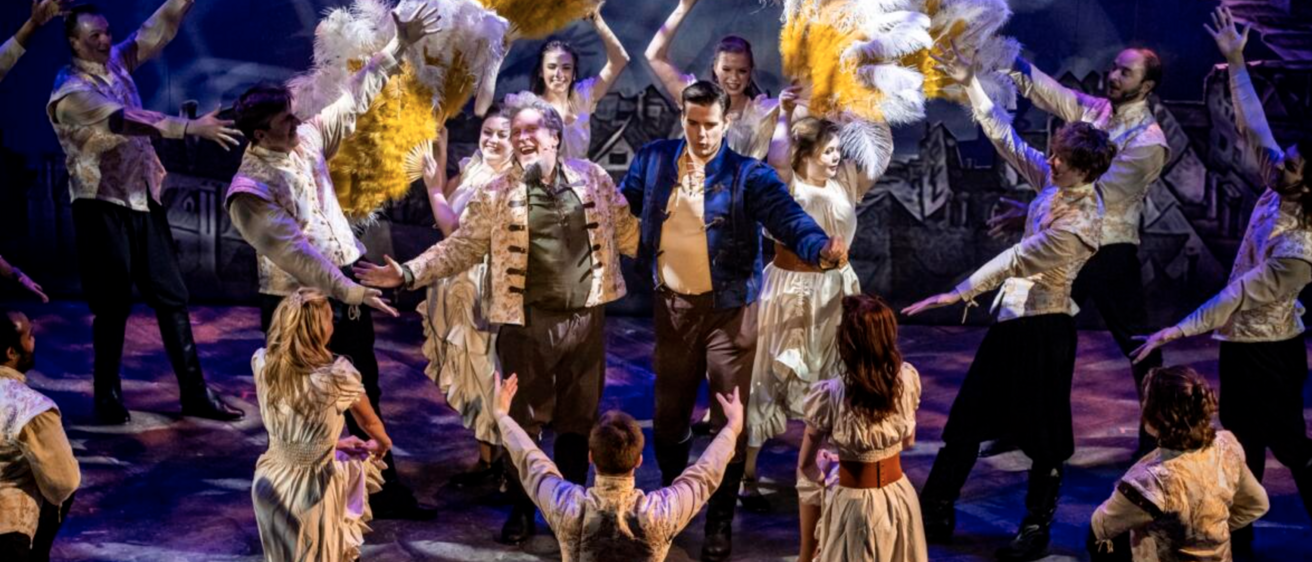 2024 Music and Theatre BA Brandon Burkhardt performing onstage during Theatre Cedar Rapids' production of "Something Rotten!" in 2024