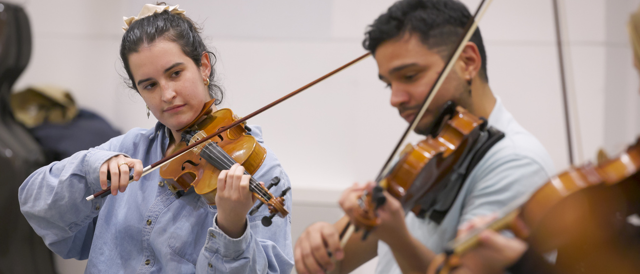 violin students in residency class with composer Jessie Montgomery