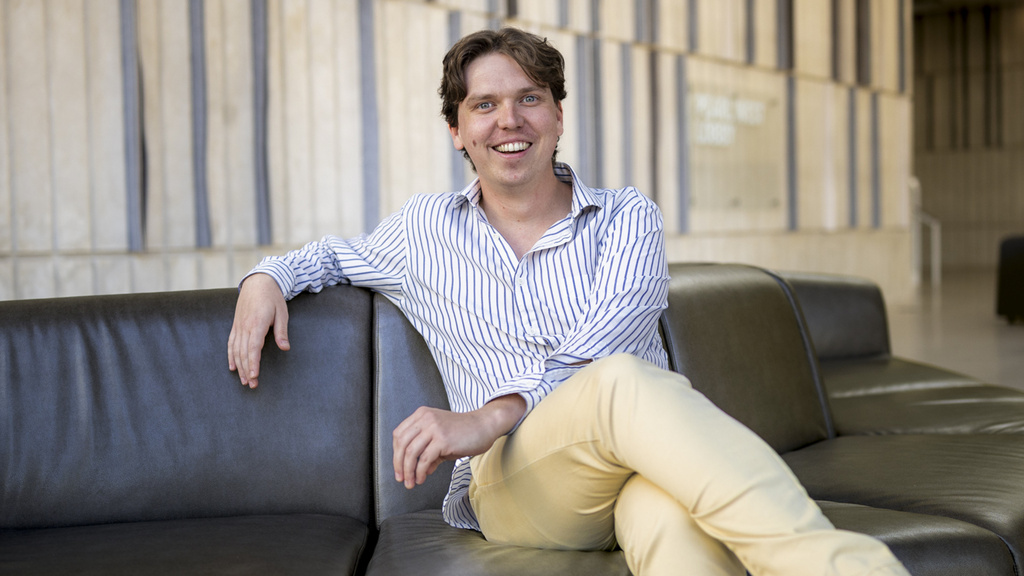 Kevin Swenson, seated in Voxman Music Building