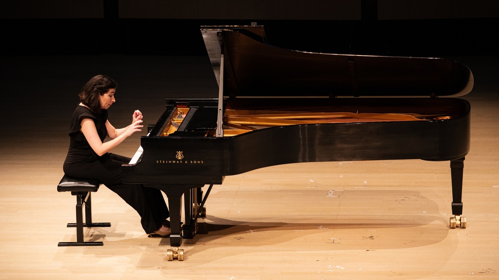 pianist performing in concert hall