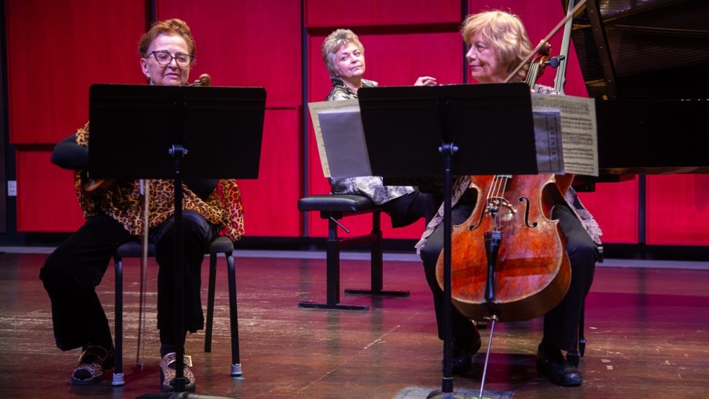 Almita Vamos plays the violin, Tanya Carey plays the cello, and Ksenia Nosikova plays the piano during the Guest Chamber Recital at Voxman Music Building on Sunday, Nov. 9, 2025.