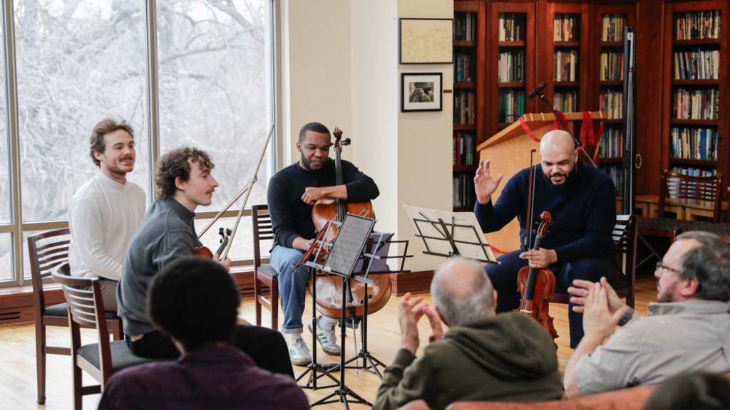 Devin Moore plays the violin in the Dey House, in Iowa City, IA, on Tuesday, Feb. 24, 2026. The Isidore string quartet had an hourlong concert, consisting of contemporary works and classical music.