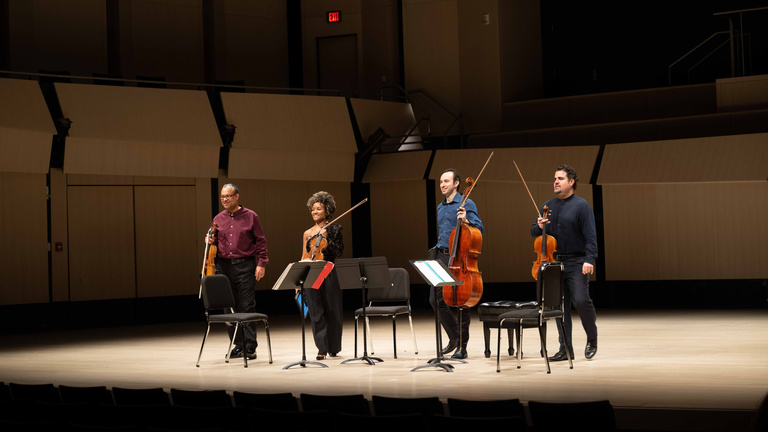 The Harlem Quartet performs in the Voxman Music Building Concert Hall as part of the UI String Quartet Residency Program